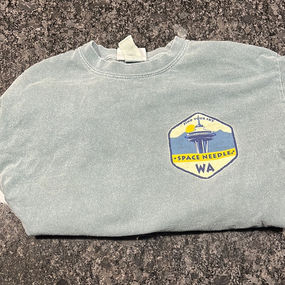 Turquoise long sleeve space needle shirt